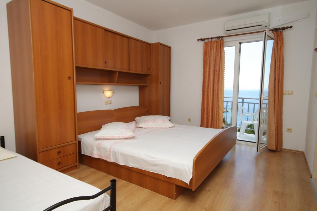 Apartments And Rooms With Parking Space Brela, Makarska - 6895 Esterno foto